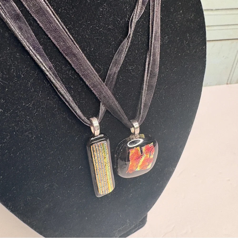 Two Handmade Artist Signed Dichroic Glass Pendant Necklaces on Black Ribbon